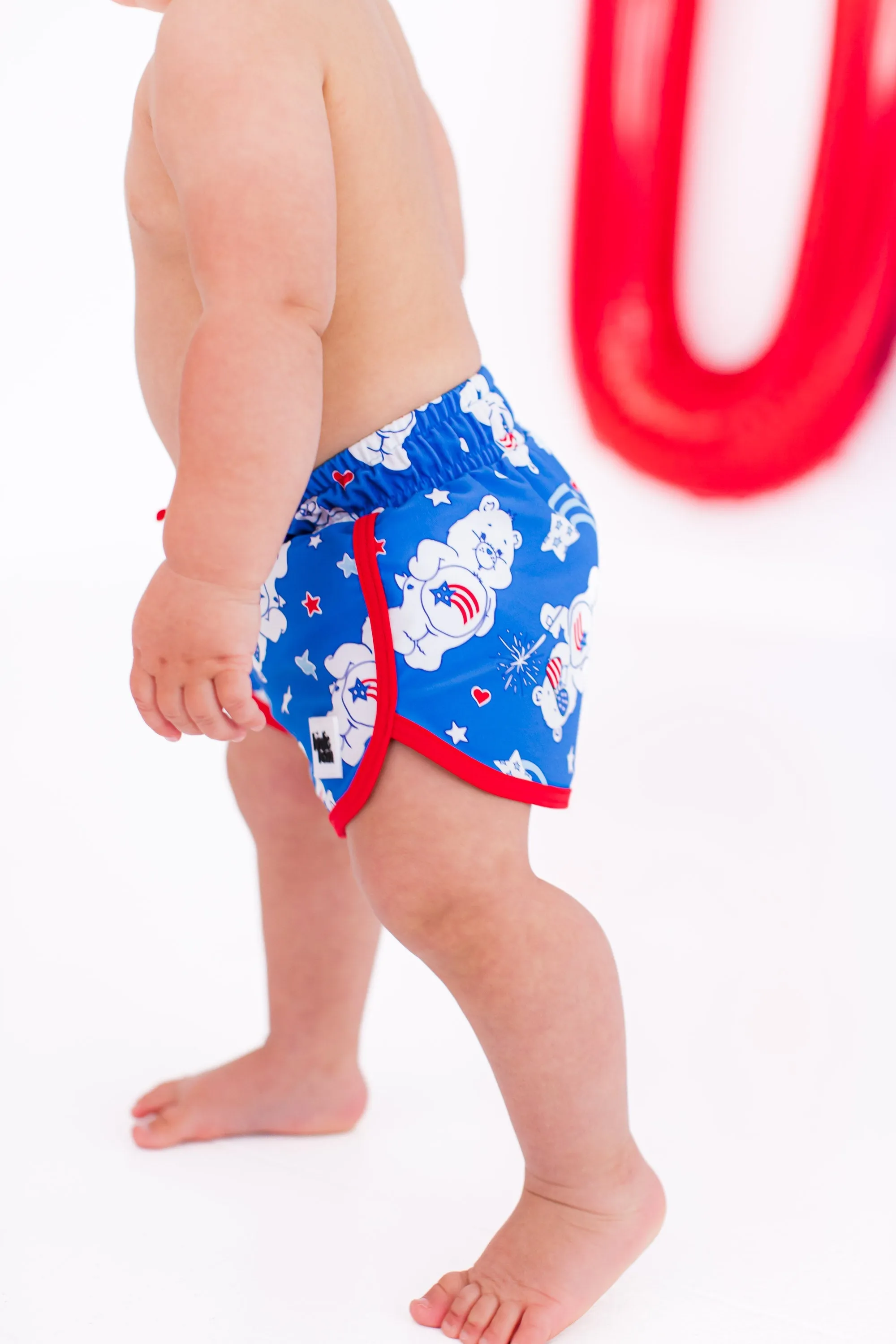 Care Bears™ America Cares Badeshorts für Babys und Kinder_Birdie-Bean