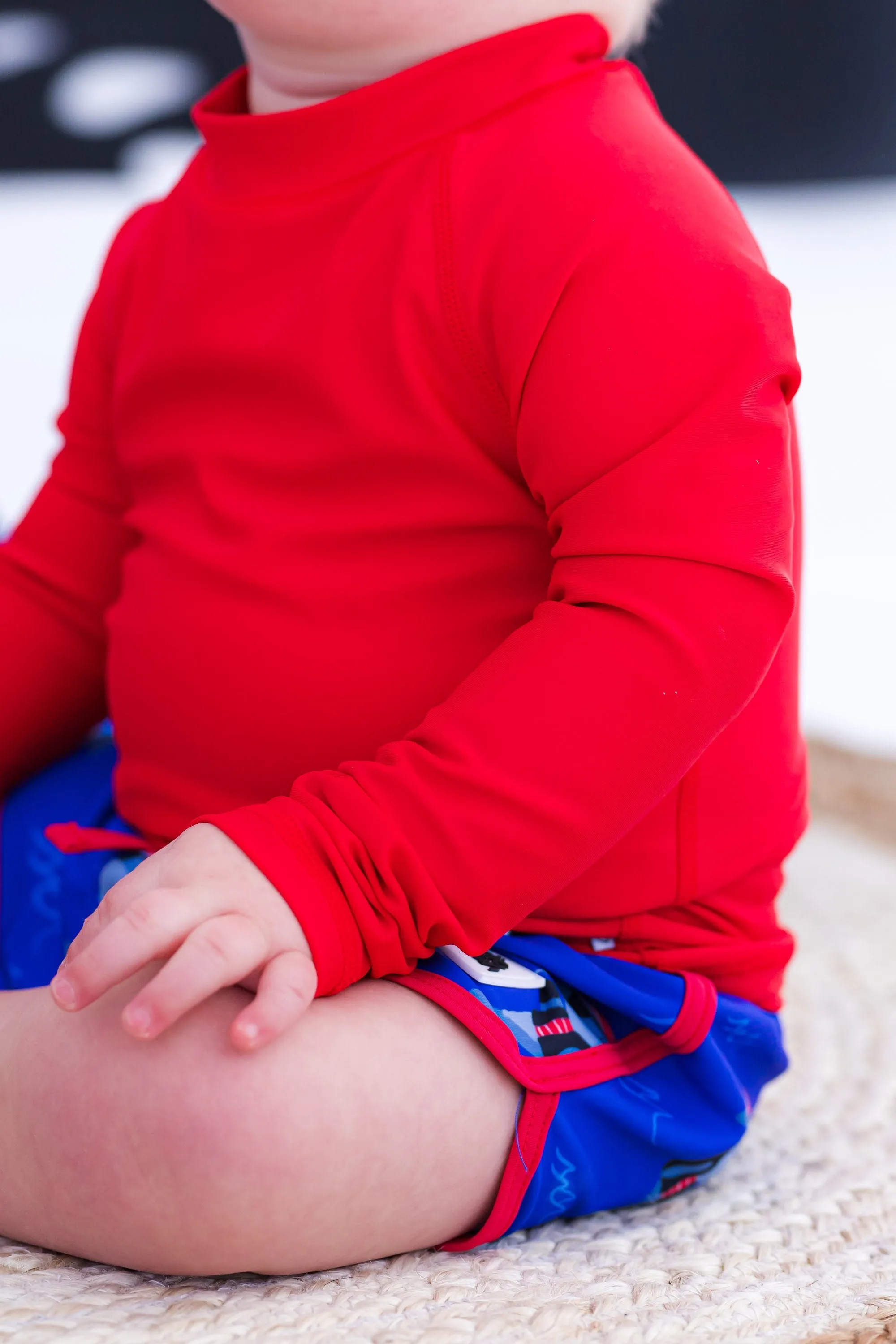 Karmesinrotes Rashguard-Babykids_Birdie-Bean