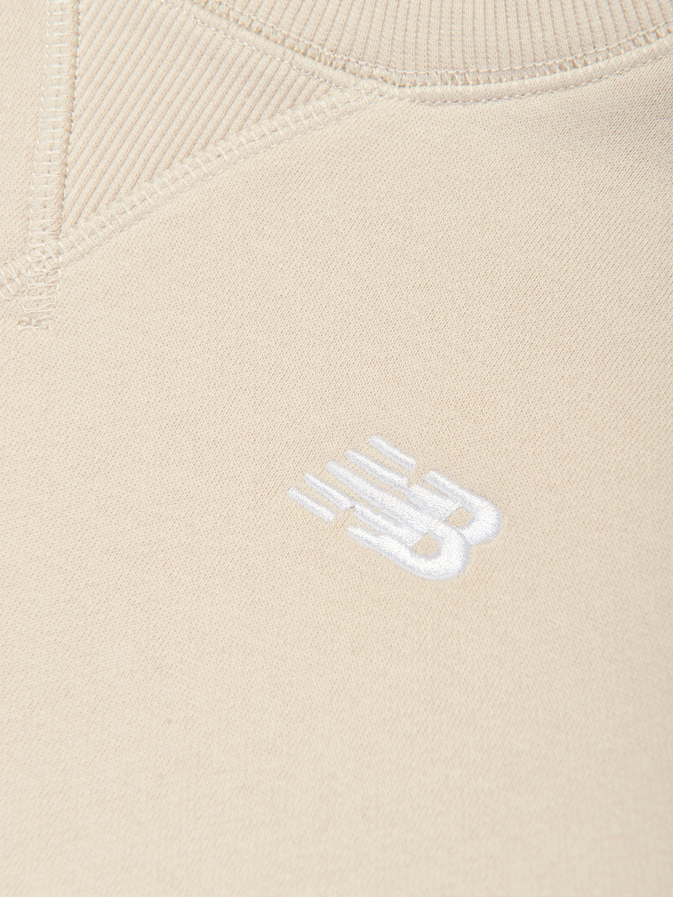 New Balance Jungen Sweatshirt mit kleinem Rückengrafik in Beige