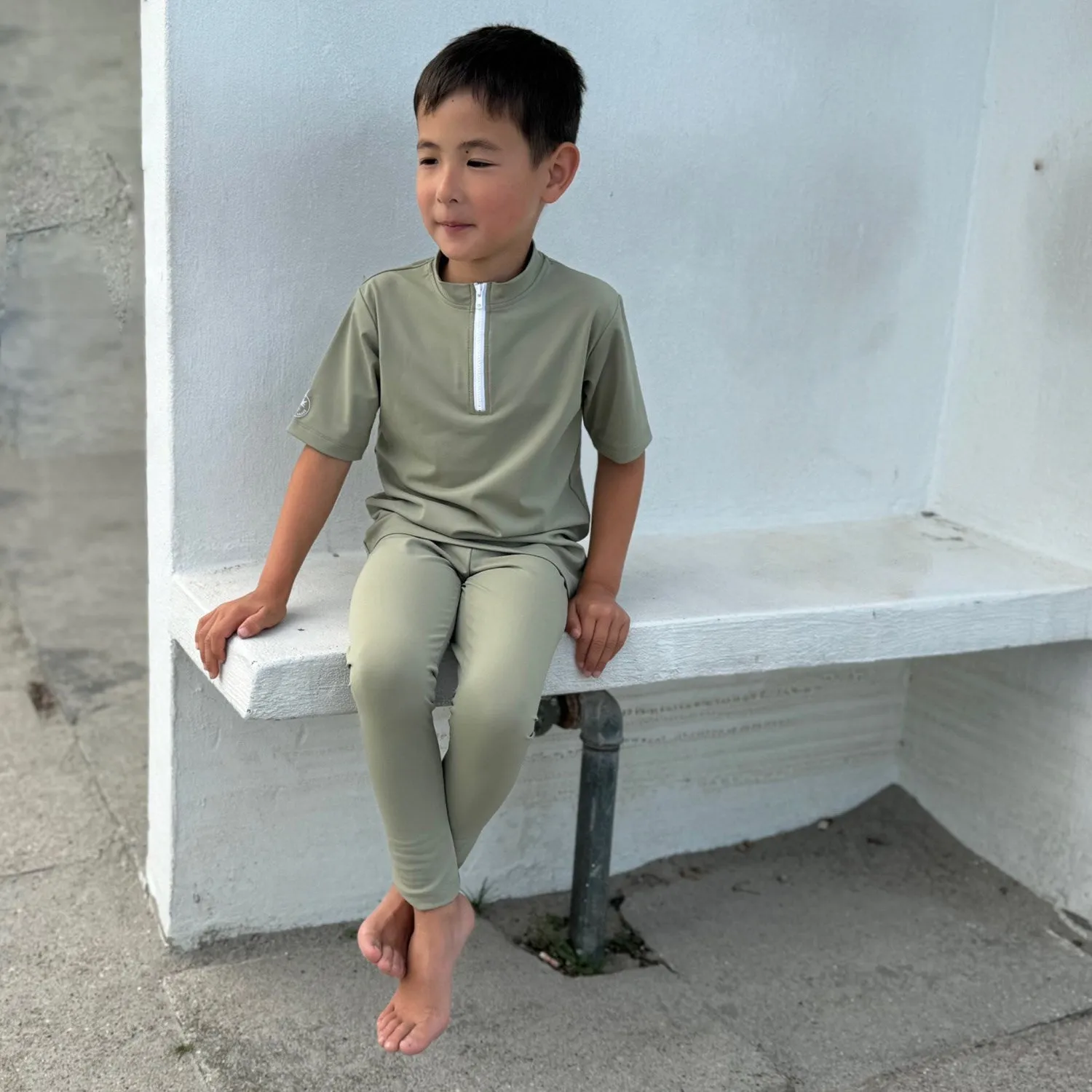 Petit Crabe Olive Fliege UV-Leggings Petit-Crabe